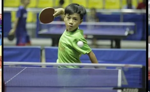 Youth playing table tennis